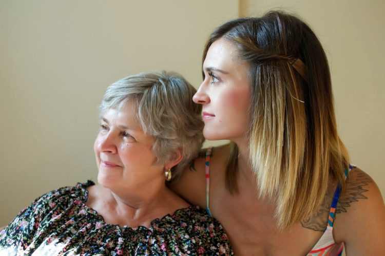 mother and daughter embracing
