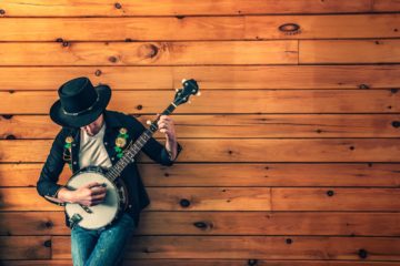 man playing banjo